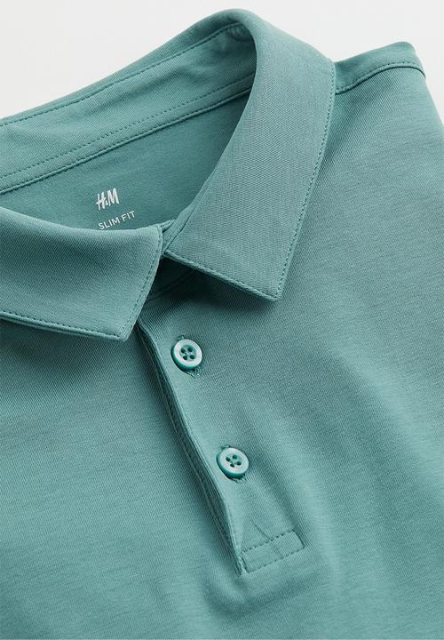 H&M - Slim fit polo shirt - turquoise