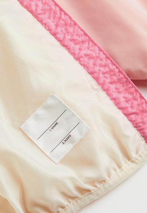 H&M - Block-coloured windbreaker - light beige/block-coloured