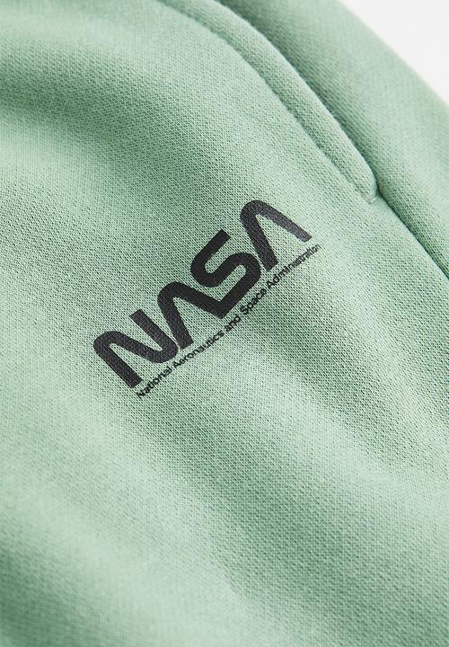 H&M - Relaxed fit sweatpants -  light green/nasa