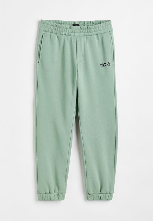 H&M - Relaxed fit sweatpants -  light green/nasa