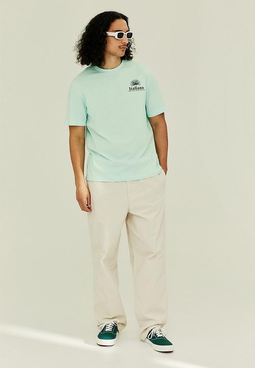 H&M - Regular fit printed t-shirt - turquoise/italiano