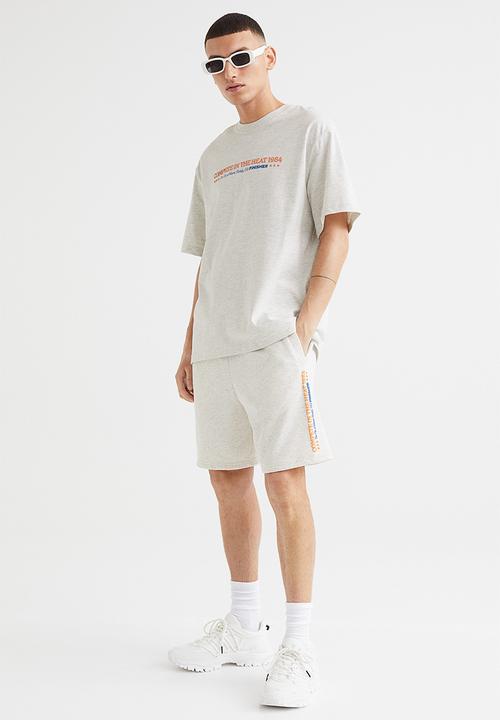 H&M - Relaxed fit printed t-shirt - light grey marl/compete