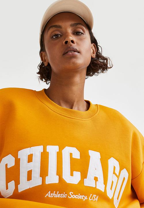 H&M - Crew-neck sweatshirt - mustard yellow/chicago