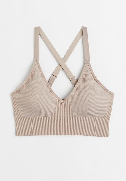 H&M - Drymove™ medium support sports bra - light beige