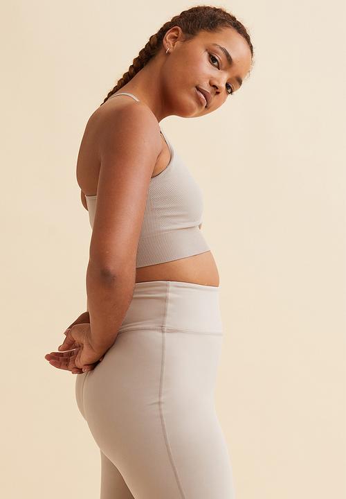 H&M - Drymove™ medium support sports bra - light beige