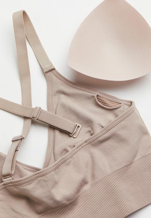 H&M - Drymove™ medium support sports bra - light beige