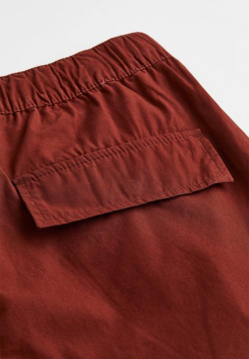 H&M - Relaxed fit belted trousers - rust brown