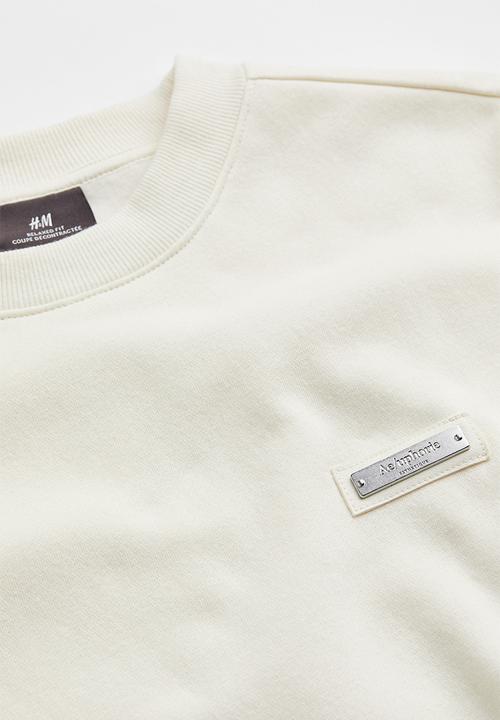 H&M - Relaxed fit appliquéd sweatshirt - cream