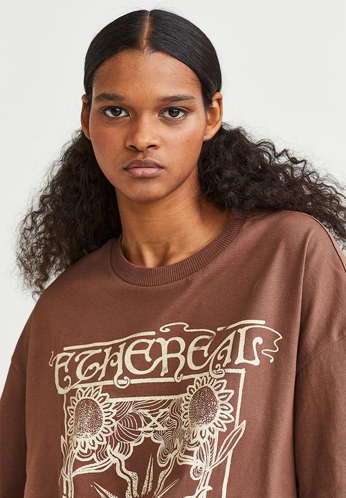 H&M - Oversized printed T-shirt - brown/sunburst