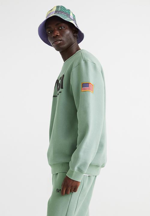 H&M - Printed sweatshirt - light green/nasa