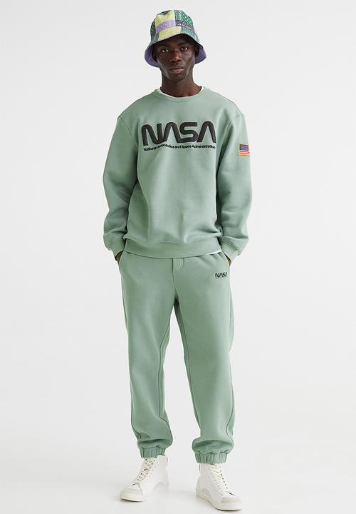 H&M - Printed sweatshirt - light green/nasa