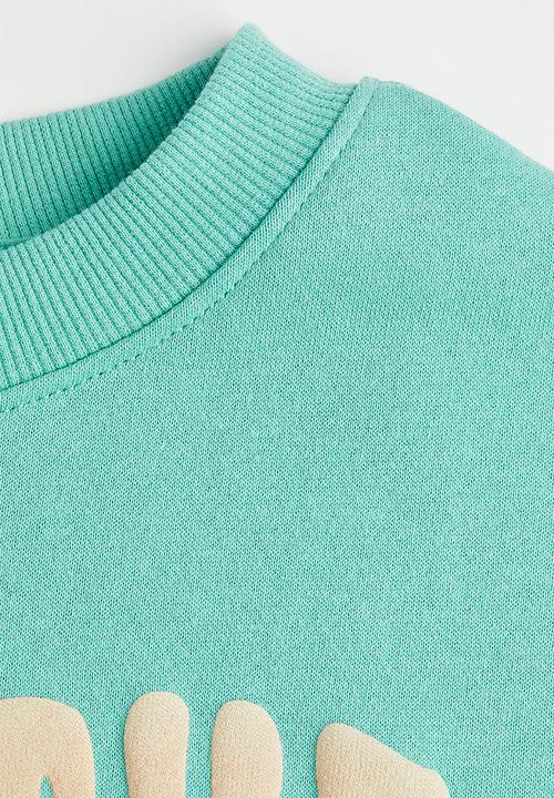 H&M - Oversized sweatshirt - turquoise/breathe