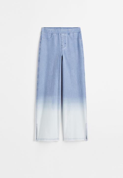 H&M - Wide fit trousers - denim blue/ombre