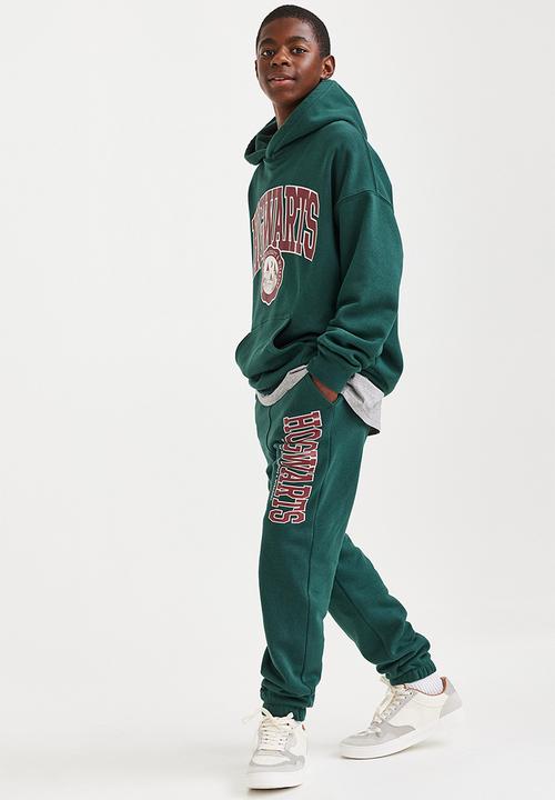 H&M - Printed joggers - dark green/harry potter