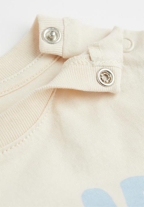 H&M - Cotton T-shirt - light beige/beyond awesome