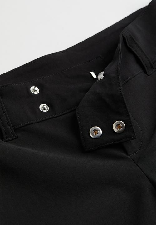 H&M - Low-waist flared trousers - black