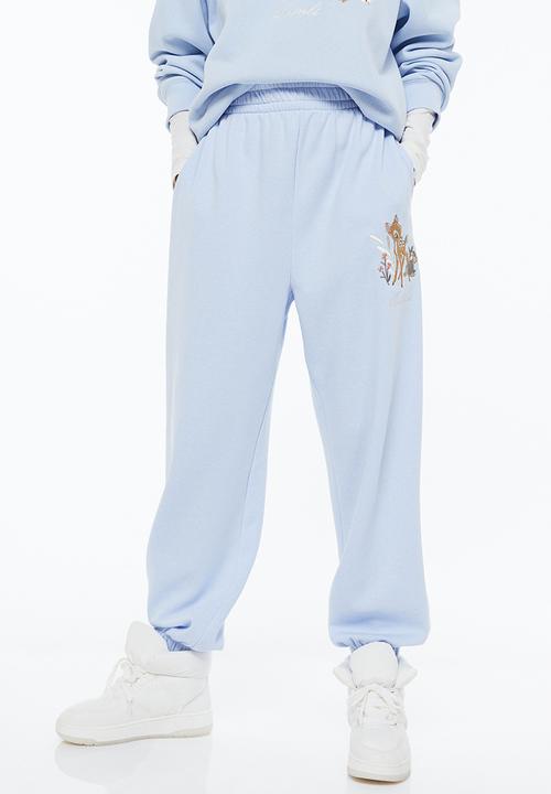 H&M - Printed joggers - light blue/bambi