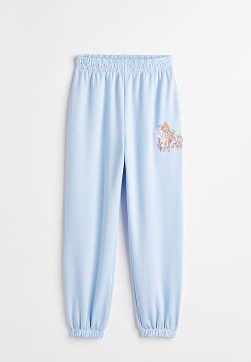H&M - Printed joggers - light blue/bambi