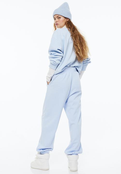 H&M - Printed joggers - light blue/bambi
