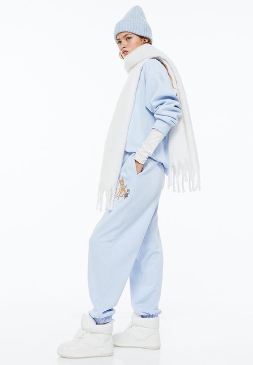 H&M - Printed joggers - light blue/bambi