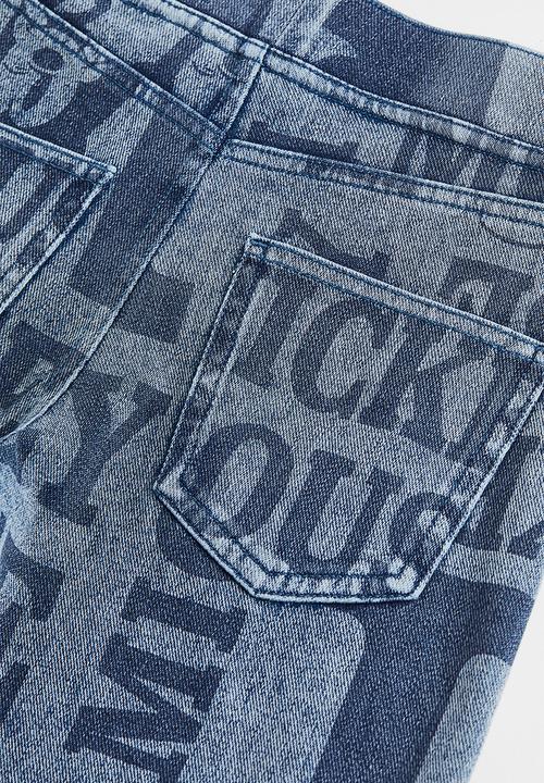 H&M - Wide printed jeggings - denim blue/mickey mouse