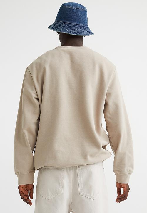 H&M - Regular fit printed sweatshirt - beige/harvard university