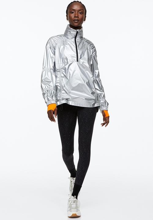 H&M - Reflective running tights - black/patterned