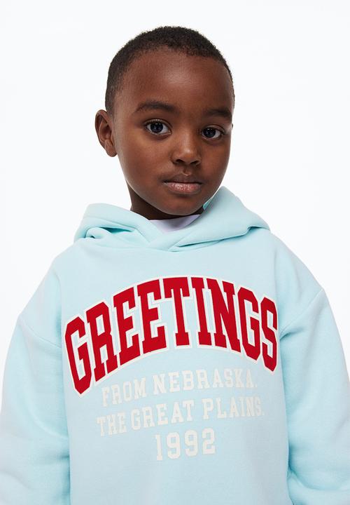 H&M - Printed hoodie - light turquoise/greetings