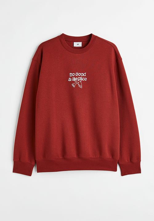 H&M - Relaxed fit printed sweatshirt - rust orange/do good