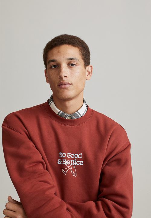 H&M - Relaxed fit printed sweatshirt - rust orange/do good