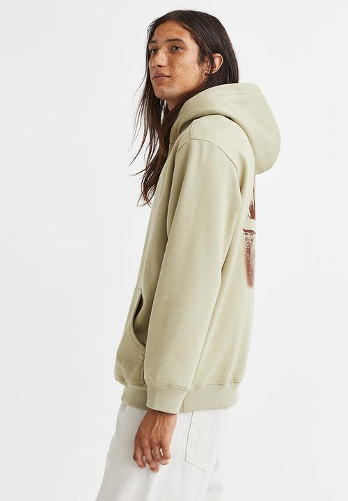 H&M - Relaxed fit hoodie - beige/billie eilish