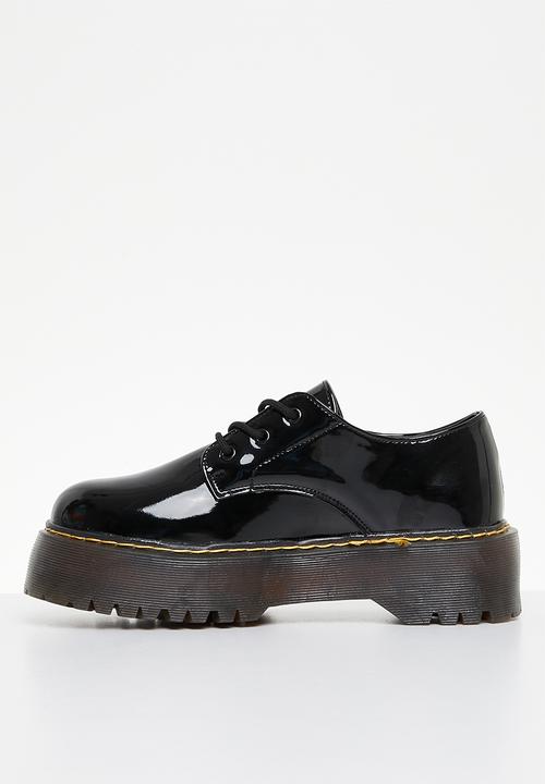 Jada - Smooth lace-up brogue - black