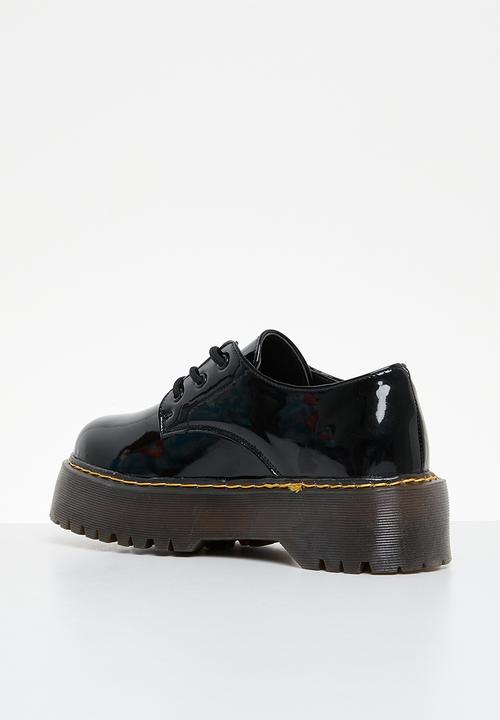 Jada - Smooth lace-up brogue - black