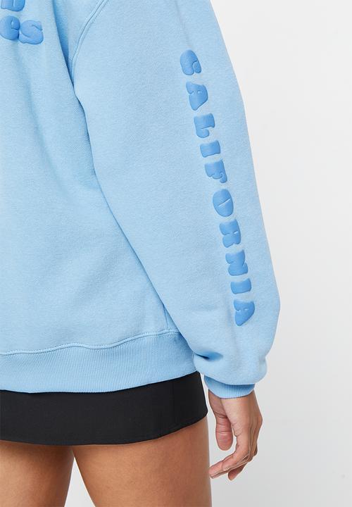 Supré  - Paige oversized printed hoodie -  cali blue/la