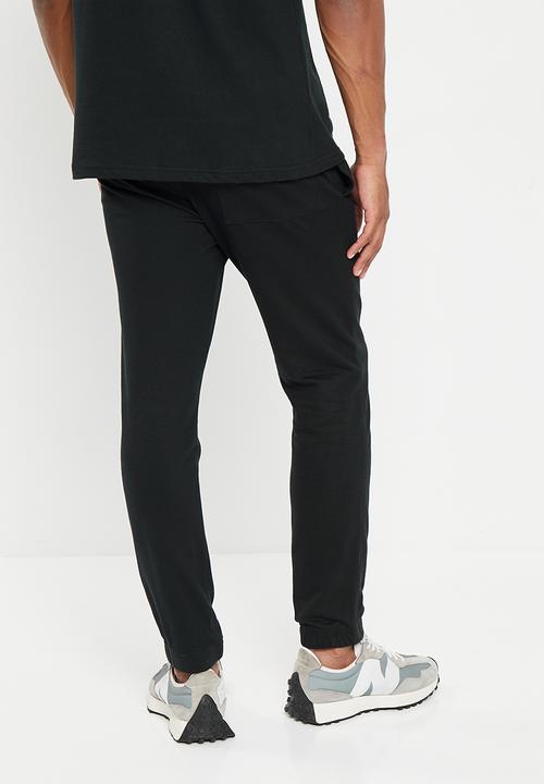 Rip Curl - Fade out icon trackpant - black & blue 
