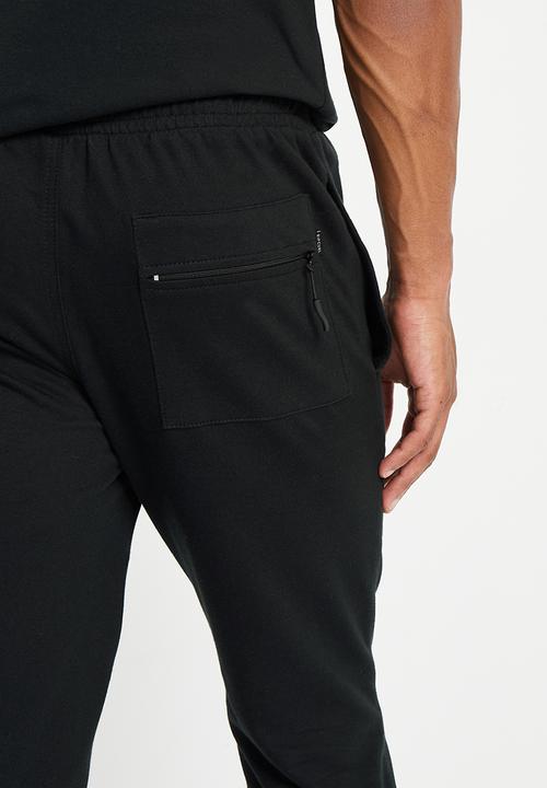 Rip Curl - Fade out icon trackpant - black & blue 