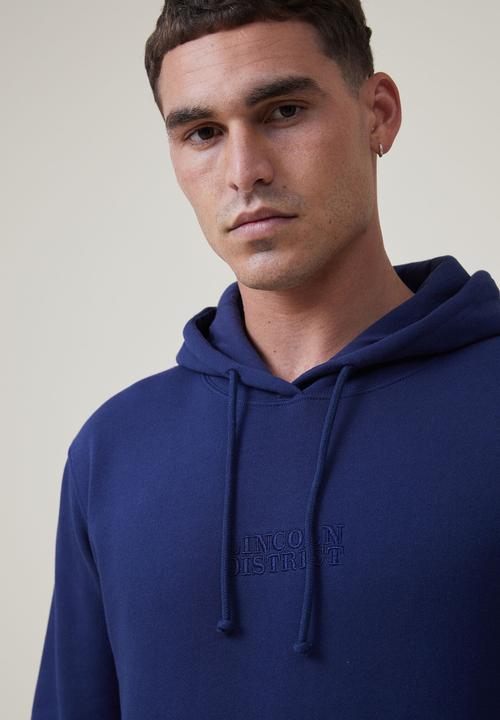 Cotton On - Graphic fleece pullover - indigo/lincoln district