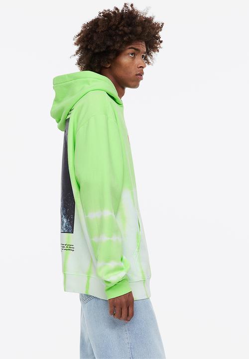 H&M - Relaxed fit hoodie - bright green/jaws