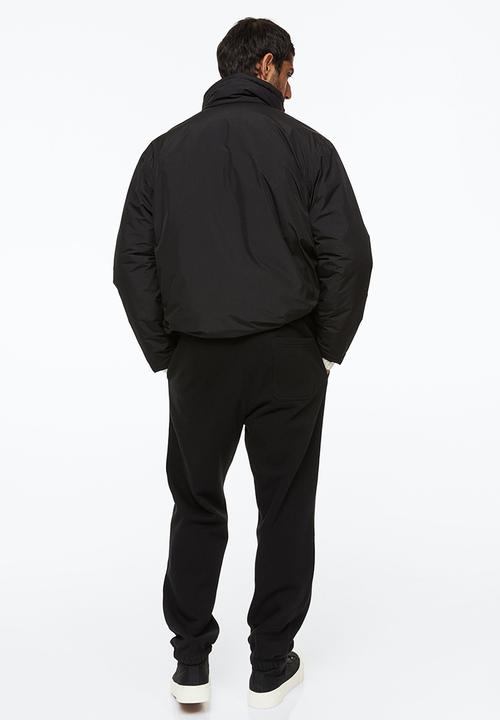 H&M - Relaxed fit sweatpants - black/new york lights