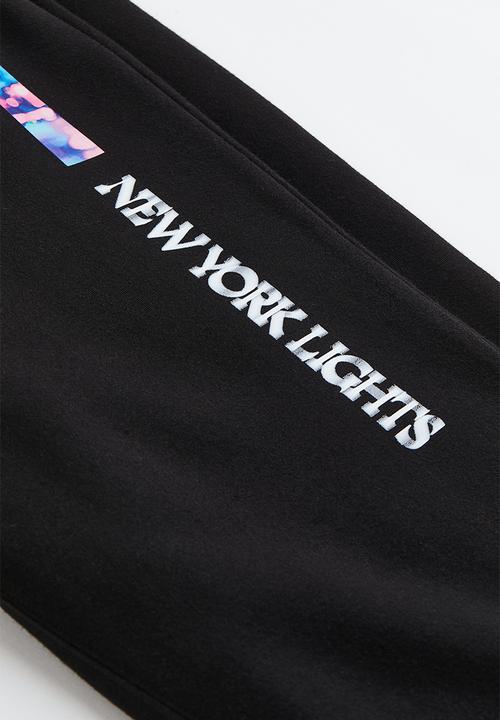 H&M - Relaxed fit sweatpants - black/new york lights