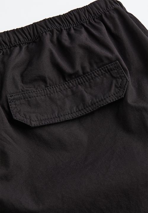 H&M - Parachute trousers - black
