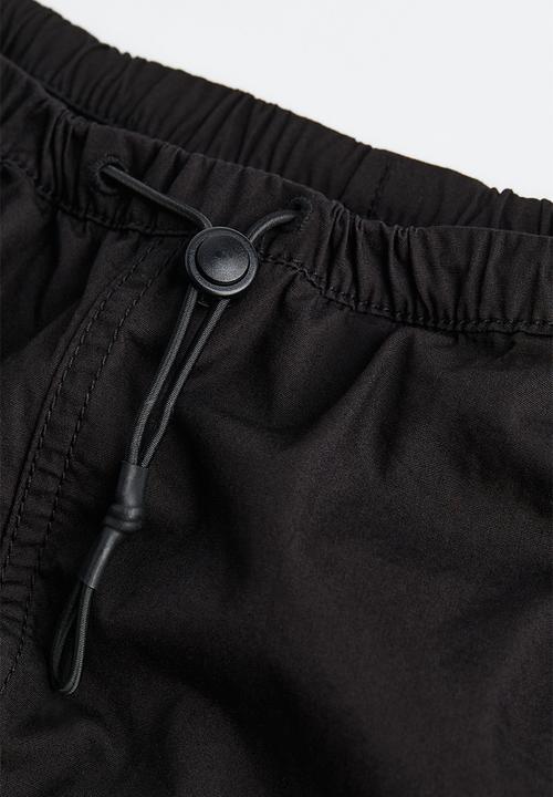H&M - Parachute trousers - black