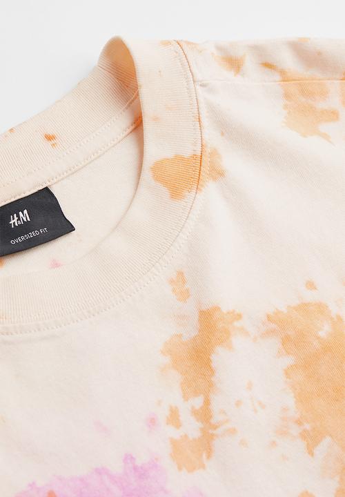 H&M - Oversized cotton T-shirt - orange/tie-dye