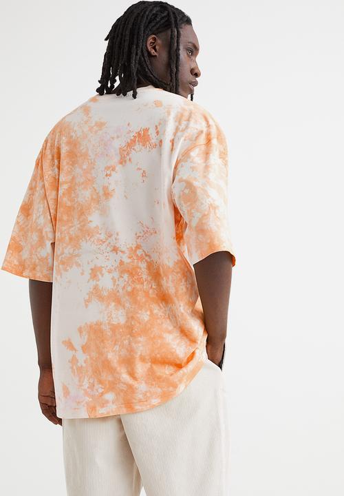 H&M - Oversized cotton T-shirt - orange/tie-dye