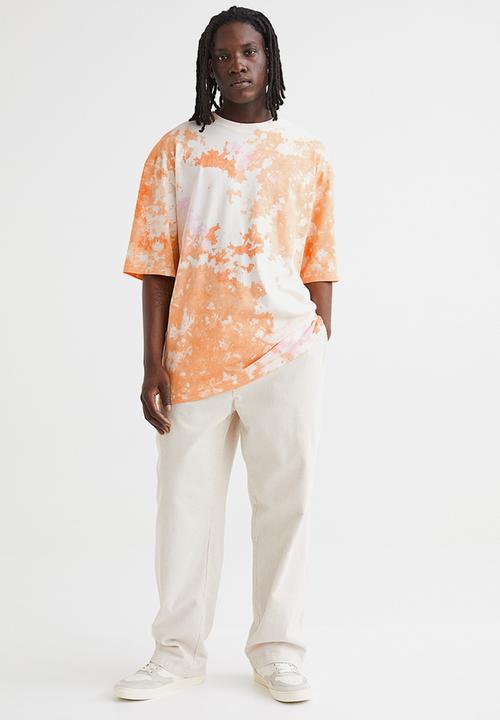 H&M - Oversized cotton T-shirt - orange/tie-dye