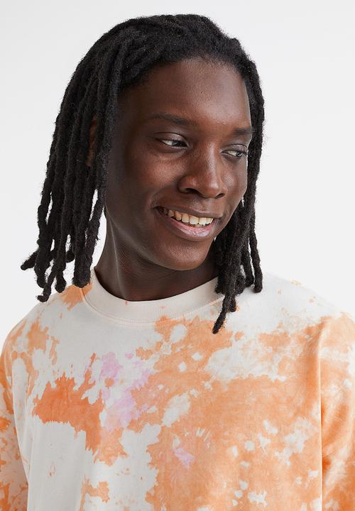 H&M - Oversized cotton T-shirt - orange/tie-dye