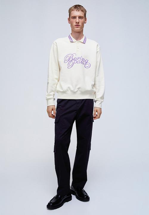 H&M - Regular fit polo shirt - cream/boring pals