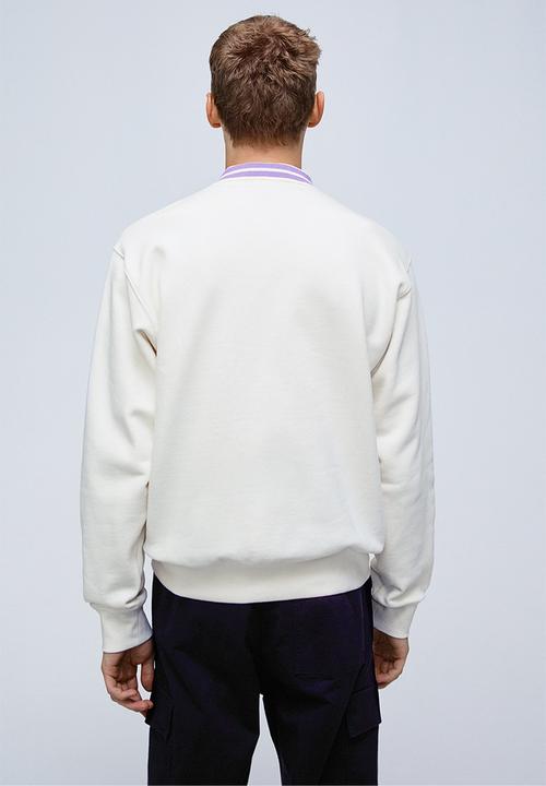 H&M - Regular fit polo shirt - cream/boring pals