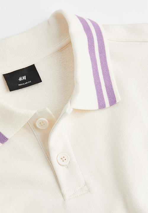 H&M - Regular fit polo shirt - cream/boring pals