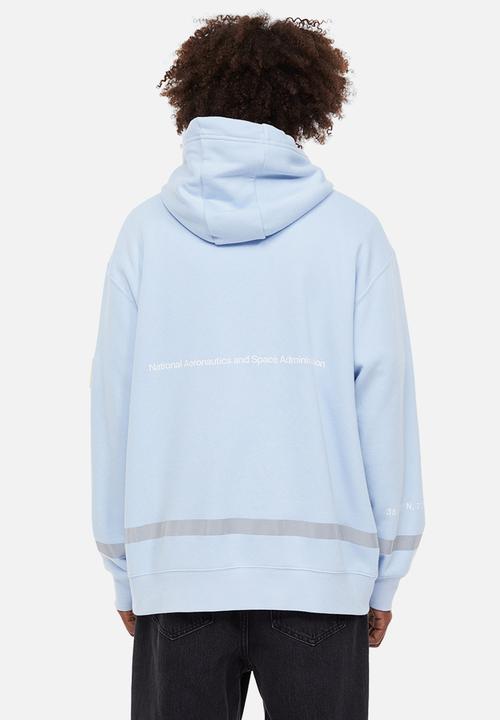 H&M - Relaxed fit hoodie - light blue/nasa